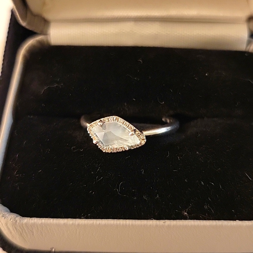 Rough cut, light blue sapphire ring